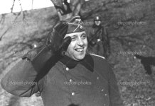 depositphotos_36456647-stock-photo-smiling-german-nazi-soldier-salutes.jpg