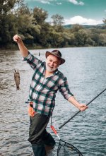 happy-old-fisherman-caught-trout-fish-portrait-cheerful-smiling-senior-man-fishing-grandfather...jpg