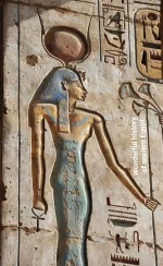 ancient-carved-image-of-the-egyptian-goddess-isis-with-v0-mug1m3nlrzp81.webp